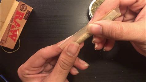 How to Roll a Joint with Raw Paper: A Journey Through Creativity and Precision